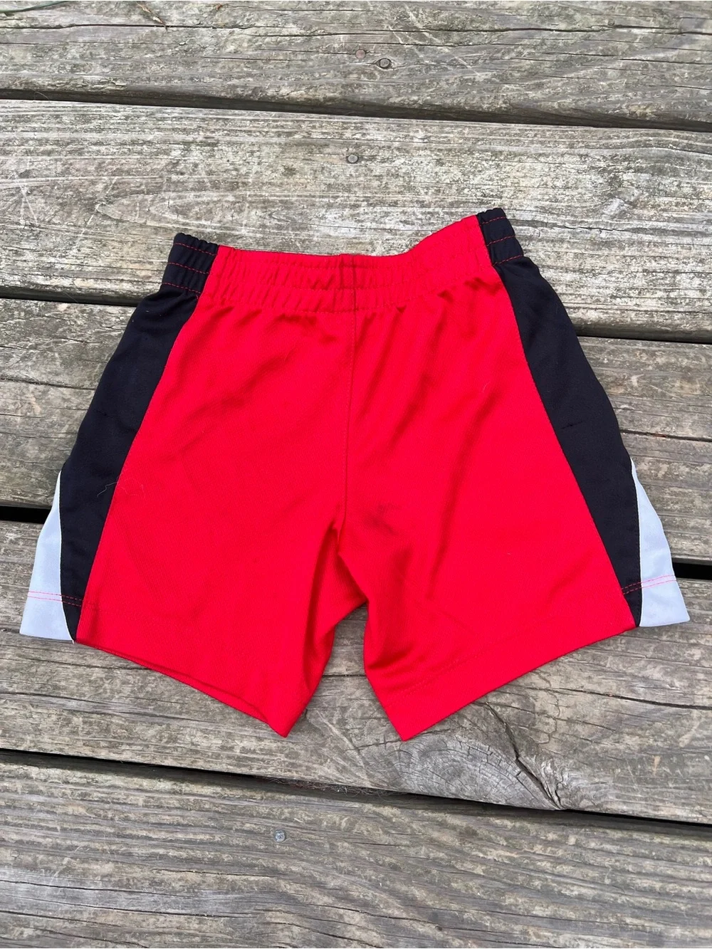 Nike Red Kids Athletic Shorts with Black and White Side Panels size xs